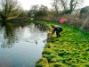 Landing a trout on fly from the River Test